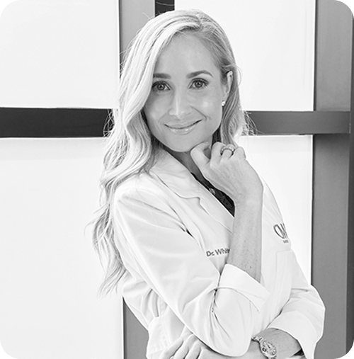 Dr Witney in a white lab coat