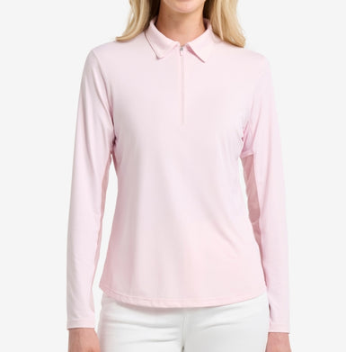 A pink long sleeved top on a woman against a white background.