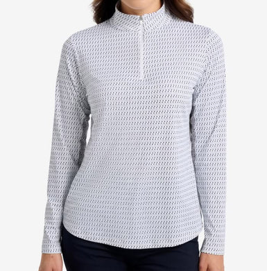 A woman wearing a long sleeved top with a neck zip and high neck.