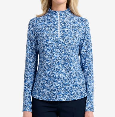 Front of a blue floral top on a woman
