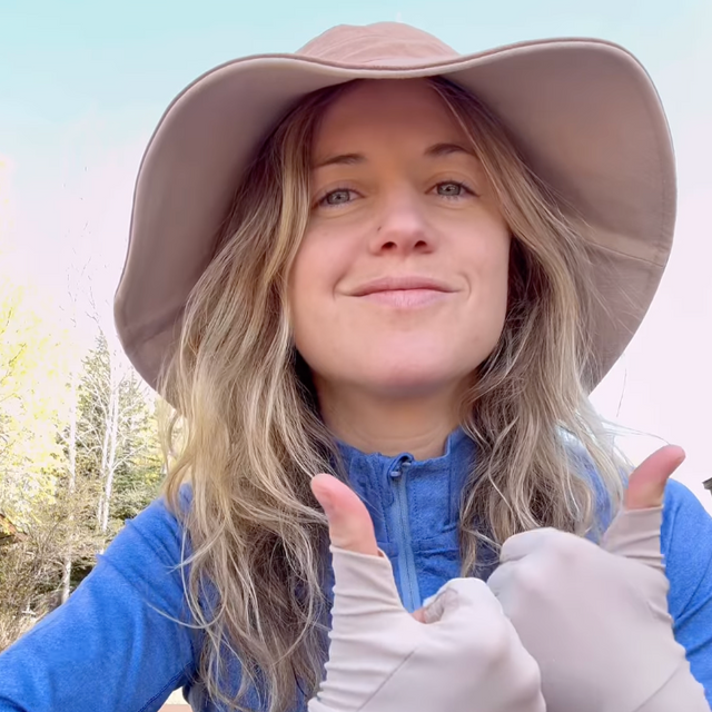 A Lady wearing a Solbari UPF 50 hat and fingerless gloves.