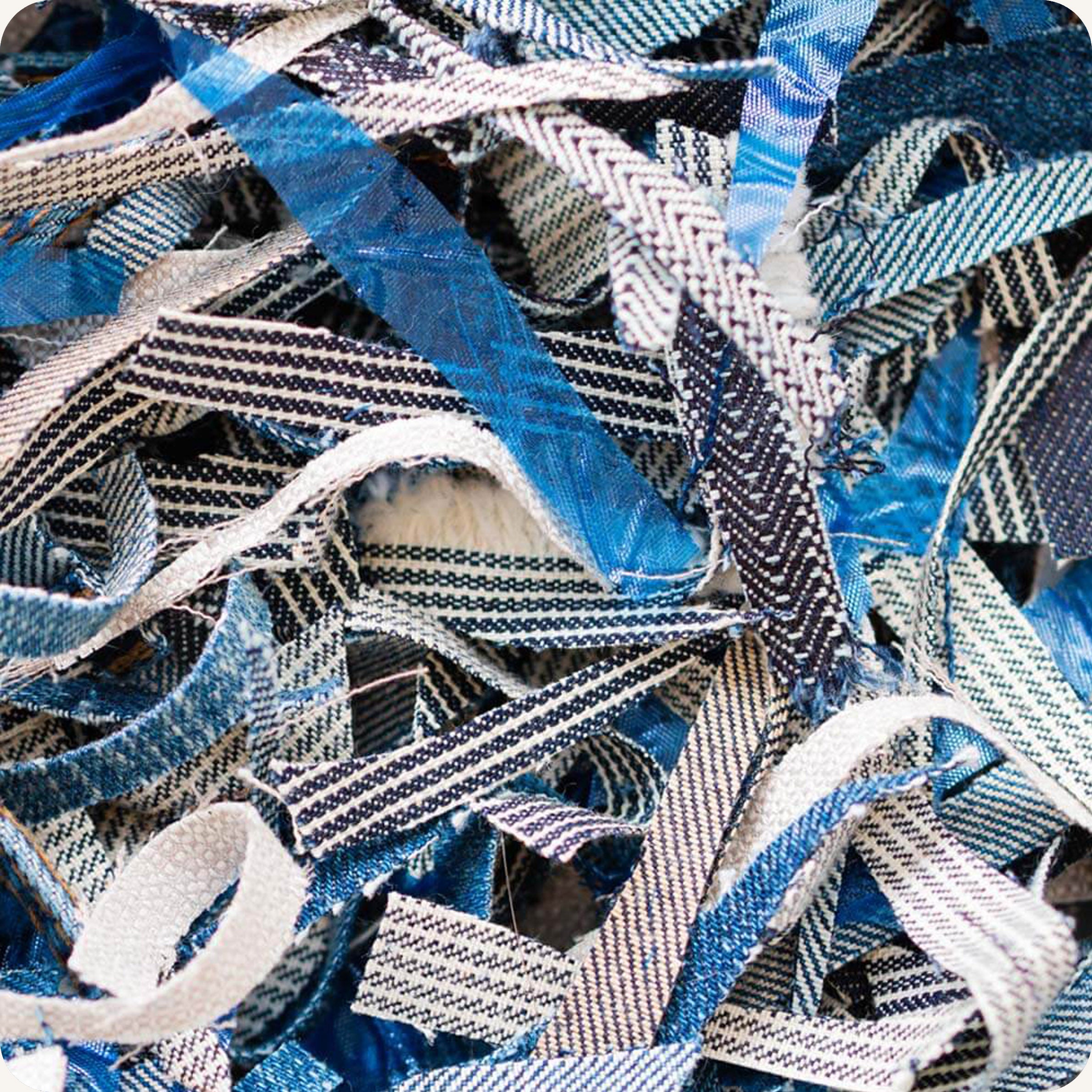 Blue shredded fabric scraps